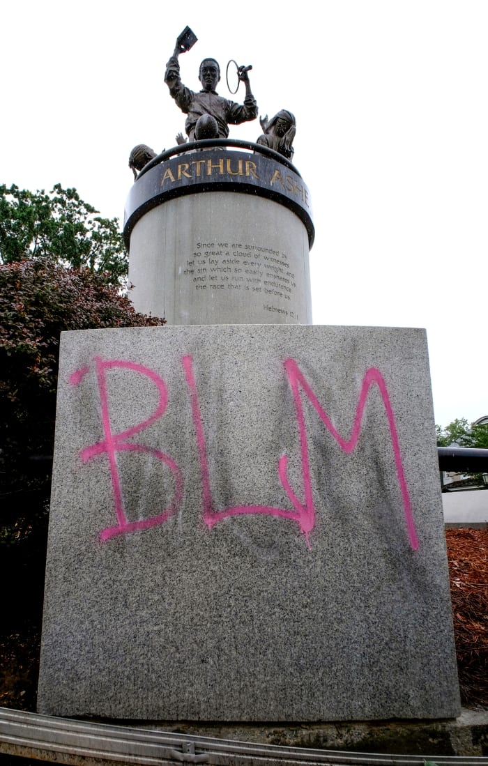 Volunteers and protesters kept Ashe's statue from being defaced with white supremacist graffiti last summer.
